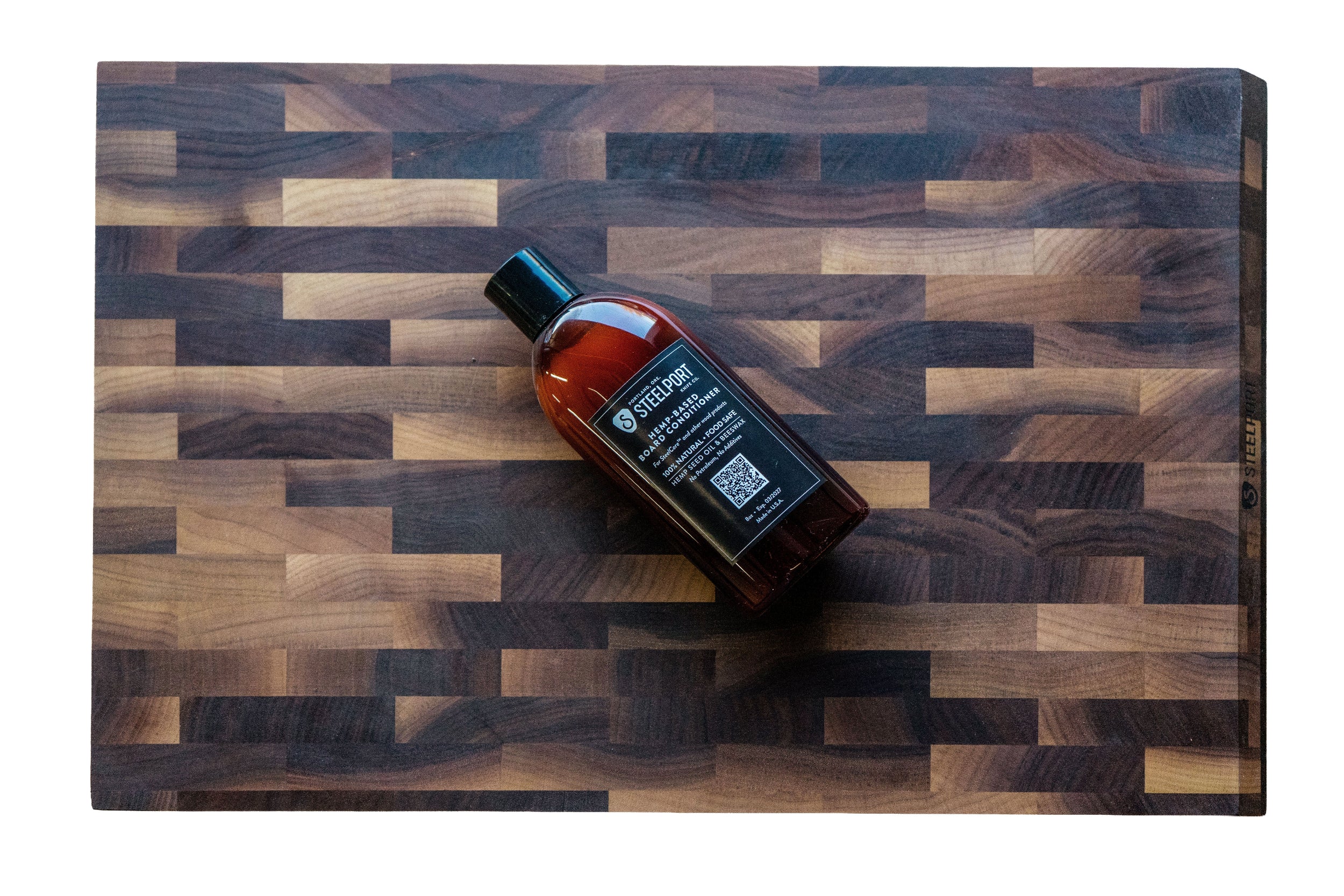 STEELPORT board conditioner on a wooden cutting board