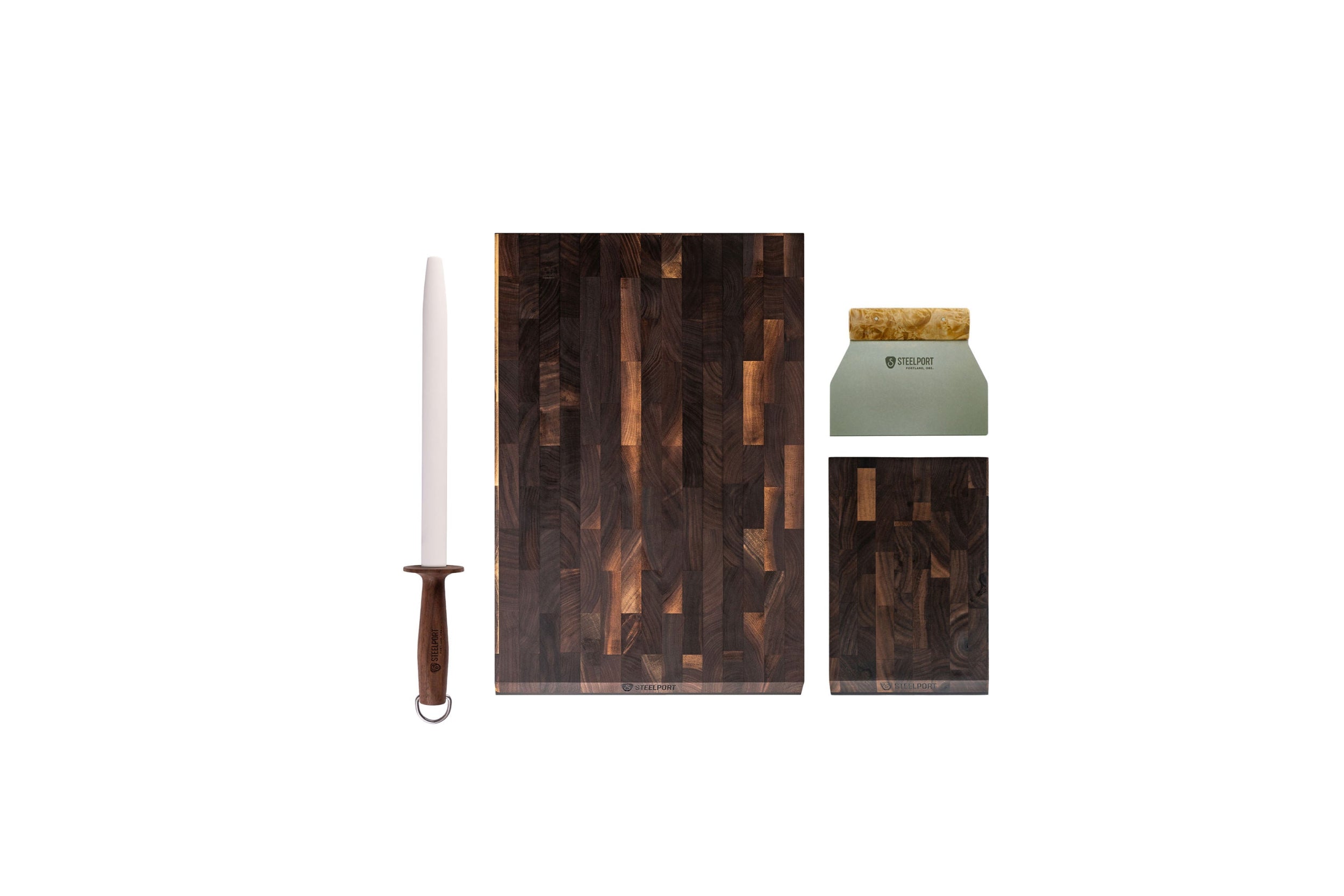 STEELPORT SteelCore™ cutting board with a knife and a candle on a white background